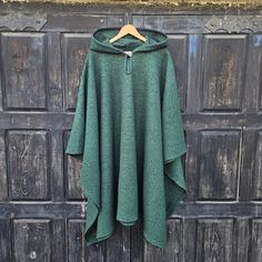 Wool blanket poncho cape, ruana One size fits all  -  men or women.  Available with hood or without hood Available in brown squares and gray (Charcoal/ Grey Salt & Pepper) 100% wool CARE: Hand-wash and hang to dry, light iron if needed, or dry clean. Length of poncho is 90cm or 35.5inch Length of arm (from neck to arm end) 60cm or 23.5inch Hooded Cape One Size For Outdoor, One Size Hooded Cape For Outdoor, One Size Poncho For Outdoors, Outdoor Poncho With Cape Shape, Green Hooded Poncho For Winter, Oversized Cape Poncho For Outdoor, One Size Poncho Cape For Outdoor, Oversized Green Cape For Winter, Oversized Hooded Cape For Outdoor