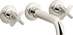 two chrome faucets with handles on each side and the other hand shower head