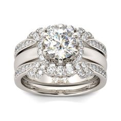 a white gold engagement ring and matching wedding band