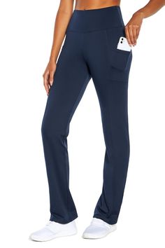 PRICES MAY VARY. High-rise, full length bootleg yoga pant with a 4 inch waistband for tummy control and slimming compression. Flex fabric is up for the challenge featuring moisture-wicking fabric that’s ready to take you to the heat, maximum ventilation, and 4-way stretch flexibility. Handy side pockets to stow essentials. Features a bootcut silhouette that flatters any figure. Inseam: 32 inches Stretch Pants Outfits, Stretch Flexibility, Travel Pants Women, Travel Pants, Bootcut Pants, Yoga Pant, Clothes Closet, Stretch Pants, The Challenge