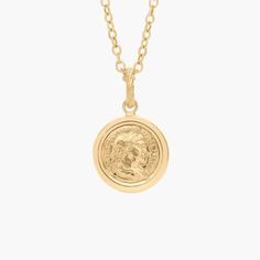 This 14K gold pendant features a detailed coin design that exudes timeless elegance and vintage appeal. Suspended on a delicate chain, it 's alluring design is sure to intrigue whether worn alone or layered with other pieces. Coin Design, Delicate Chain, Blue Nile, Metal Necklaces, Gold Pendant, Timeless Elegance, Coin, Jewelry Necklaces, Yellow Gold