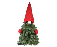 a christmas tree with an elf's hat on top