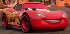 the character cars from disney pixars are driving down the street