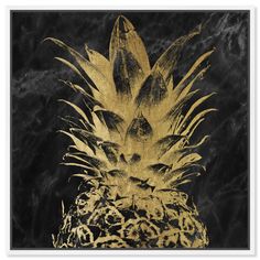 a black and gold pineapple with leaves on it's side, against a dark marble background