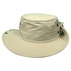 Saint Martin - Adventurer Outdoor Hat The Saint Martin Adventurer Outdoor Hat is made to tackle your outdoor excursions! Incredibly lightweight and breathable, it has many features to aid you whether you're on a hike, rafting a river, traveling, or just relaxing on the beach. Beginning with the exterior, this hat has a wide 3.25" brim at front and back and is UPF50+ UV rated for excellent sun protection. Aside from being lightweight, the crown of the hat has four mesh grommets to help keep you cool. Should you desire that traditional Aussie style, the crown has snaps on both sides to pin the brim up making way for your fishing rod, bow, rifle, or just to look the part. Inside, the hat comes with a soft sweatband, a hidden stash pocket, a chin strap for windy days, and dark green under-brim Casual Waterproof Bucket Hat For Travel, Casual Waterproof Sun Hat For Travel, Waterproof Solid Color Sun Hat For Outdoor, Waterproof Sun Hat For Outdoor, Waterproof Outdoor Bucket Hat, Waterproof Bucket Hat With Short Brim For Outdoor Activities, Waterproof Solid Color Bucket Hat For Outdoor, Waterproof Solid Bucket Hat For Outdoor Activities, Waterproof Bucket Hat For Outdoor Activities With Short Brim