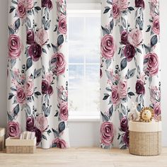 the curtains are decorated with pink flowers and green leaves, along with a teddy bear