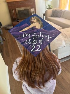 a girl wearing a graduation cap with the words i'm feeling class of 22 on it