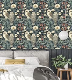 an owl themed wallpaper in a bedroom