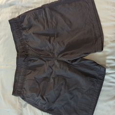 Approx 8" Inseam. Quick Dry Nylon Material With Pockets And Drawstring Waist. Nwot From A Smoke-Free Home. Black Stretch Swimwear With Pockets, Sporty Black Swimwear With Pockets, Solid Nylon Swimwear With Pockets, Black Sporty Swimwear With Pockets, Black Nylon Swimwear For Outdoor, Casual Black Nylon Swimwear, Black Swimwear Shorts With Pockets, Black Short Length Swimwear For Outdoor, Black Short Length Swimwear