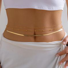 Hey beach beauties! ☀️✨ Introducing the Minimalist Multi-Layer Metal Flat Snake Chain Waist Chain, your go-to accessory for adding a touch of elegance to your summer beach look. This sleek and sexy waist chain is designed to complement your bikini or enhance your festival attire with minimalist charm. Why You'll Love It: Chic Design: Features multiple layers of flat snake chains that create a modern and minimalist aesthetic. Versatile Wear: Perfect for pairing with bikinis, beachwear, or festiva Africa Vintage, Summer Accessories Beach, Belly Belt, Flat Snake Chain, Rave Accessories, Y2k Accessories, Beach Night, Vintage Hip Hop, Style Rock