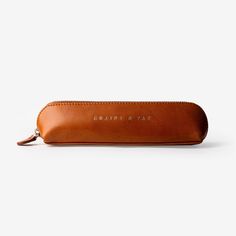 GT-103: G&T Leather Cosmetics Case, Pencils Case, Multi-Utility Pouch Dimensions: 20.5 cm (Length) x 5 cm (Width) x 5 cm (Depth)This stylish and light-weight pen/pencil/make-up case is made from real and full-grain cow pebbled leather and vegetable-tanned leather which is eco-friendly and sustainable. This multi-purpose utility product is designed to store your stationery, cosmetics, and many more things you can think of, making it a must-have item.This product is beautifully lined with a premiu Pencils Case, Pencil Case Design, Zipper Makeup, Pouch With Zipper, Leather Pencil Case, Utility Pouch, Sustainable Leather, Cosmetic Items, Orange And Turquoise