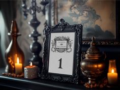 a table with candles and a framed sign on it that says, the number one