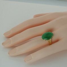 Superb Vintage 18K Yellow Gold Jade Cabochon Ring, carved designs top shank, 5/8 inch across ring, 12x18mm medium evening green low-medium dome, Ring size 8, Circa 1950, 6.5 grams Stock # BB259R25 This listing contains photographs of the actual item you will receive. Our items are in excellent condition with little or no signs of wear and many are one of a kind pre-owned estate finds. Please look closely at the pictures in this listing as they are part of the product description. Please read the Elegant Emerald Jade Ring With Cabochon, Elegant Jade Cabochon Rings, Jade Cabochon Round Stone Jewelry, Vintage Jade Cabochon Ring, Yellow Round Jade Jewelry, Sparkly Ring, Gold Diamond Band, Carved Designs, Cabochon Ring