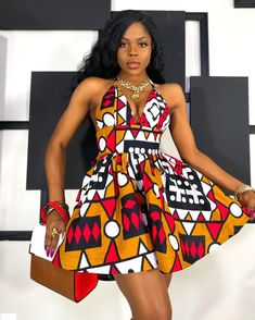 This is a unique and beautiful dress perfect for either casual or formal occasions. FABRIC DETAILS/ OVERVIEW Soft and comfortable African Ankara Kente Cotton Fabric. Women/Ladies Party gown Halter Tie Straps Bust padding Elastic waist 2 side pockets Corset fit/high waist Stretchable waistband Deep V-neckline Sleeveless design Backless dress Back zipper closure Fit and Flare Mini length Occasion: Birthday, graduation, party, dinner date, wedding guest True to size Also suitable for plus size Disc Short Shweshwe Dresses, Fitted Dress With Geometric Pattern For Vacation, African Halter Dress, Red Dresses With Bold Print, Fitted Black Dress With Bold Print, Bohemian Fitted Dresses With Vibrant Print, Fitted Bohemian Dress With Vibrant Print, Fitted Sundress With Vibrant Print, Fitted Multicolor Printed Sundress