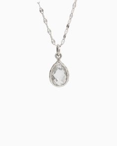 The Dewdrop Stone Pendant boasts a distinctively timeless design, featuring a pear-shaped white topaz stone cradled in sterling silver. Whether worn on its own for understated elegance or paired with a pair of Dewdrop Stone Earrings for a coordinated look, this pendant adds a touch of sophistication to any outfit. Pair with your favorite chain, sold separately. Metal: Sterling silver Stone: White topaz Dimensions: 20mm x 10mm Style #: P195W Everyday Silver Pear-shaped Jewelry, Teardrop Jewelry With Si Clarity For Formal Occasions, Classic Silver Drop Necklace, Formal Teardrop Jewelry With Si Clarity, Timeless White Teardrop Jewelry, Sterling Silver Pear Shaped Drop Necklace For Formal Occasions, Pear Shaped Sterling Silver Drop Necklace For Formal Occasions, Silver Pear Drop Necklace For Anniversary, Formal Sterling Silver Pear Drop Necklace