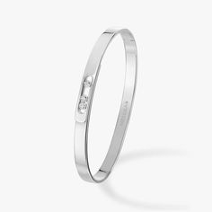 White Gold Diamond Bangle Bracelet Move Noa | Messika 10092-WG Elegant Sterling Silver Bangle For Formal Occasions, White Gold Bangle For Formal Occasions, Elegant Polished Sterling Silver Bangle, Elegant Sterling Silver Bangle With Polished Finish, White Gold Bangle For Evening, Shiny Sterling Silver Bangle, Elegant Platinum Bangle For Formal Occasions, Evening White Gold Bracelets With Polished Finish, Luxury Sterling Silver Formal Bangle