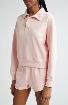 A sharp collar adds polish to a petal-pink sweatshirt cut from cozy cotton fleece. 21 1/2" length (size Medium) Button half placket Spread collar Long sleeves Ribbed cuffs and hem 100% cotton Machine wash, tumble dry Made in Portugal Asian & Pacific Islander Owned/Founded Pink Cotton Sweatshirt With Ribbed Collar, Pink Cotton Top With Ribbed Collar, Pink Cotton Tops With Ribbed Collar, Pink Sweatshirt With Ribbed Collar For Spring, Relaxed Fit Collared Polo Sweater For Loungewear, Relaxed Fit Collared Sweatshirt, Collared Sweatshirt For Loungewear In Relaxed Fit, Collared Cotton Sweatshirt, Pink Long Sleeve Top With Ribbed Collar