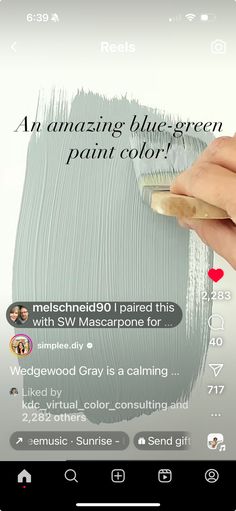 someone is using a brush to paint the wall in their home decorating project, and it looks like they are doing something right now