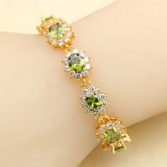 Luxury Green Peridot Gold Plated Jewelry Sets for Women Earrings Necklace Pendant Ring Bracelet Wedding Gift Quality: AAA Length of Bracelet: 18cm + 2cm Length of Necklace: 45cm + 5cm USA Ring Size: 6# 7# 8# 9# 10# Fit For: Girlfriend Mother Daughter Wife Jewelry Sets Type: Bridal Jewelry Sets Brand Name: WPAITKYS Model Number: 3256804983838375 Style: Classic Metals Type: silver Certificate: no Origin: Mainland China Main Stone: Peridot Gender: Women Item Type: jewelry sets Occasion: ENGAGEMENT Side Stone: CRYSTAL Fine or Fashion: Fine Shape\pattern: Flower Metal Stamp: 18k Luxury Green, Wife Jewelry, Silver Certificate, Jewelry Real, Pendant Ring, Bracelet Wedding, Women Earrings, Pattern Flower, Green Peridot