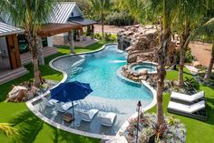 an aerial view of a pool and patio area