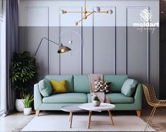 a living room with a blue couch and two chairs in front of a white table