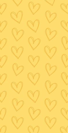 a yellow background with hearts drawn on it