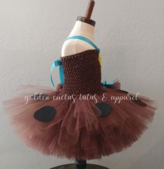 Brown tulle mixed with Brown glitter tulle and a glittery tail! The shoulder straps are adjustable. Sizing info: 6 months-2T size is roughly 8 inches long. 3-5T is roughly 10 inches long. 6-8 years is roughly 12 inches long. Brown Glitter, Tutu Dress, 6 Months, Shoulder Straps, 20 Cm, Glitter, 10 Things, Shoulder Strap, Tutus