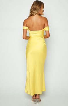 Light Yellow Off Shoulder Formal Dress

How to style:
This maxi dress () screams GLAM in the best way possible! Slip on this stunning number for your next formal () event and be sure to add dainty jewellery () and heels () to complete your look.

Features:
  
 * Light weight satin material 
 * Maxi length 
 * Slight stretch 
 * Bias cut 
 * Off the shoulder style 
 * Fully lined 
 * Invisible zip on left side 
 * Grip on inner bust  

This is the perfect formal dress for your next event! Fitted Yellow Evening Dress For Bridesmaid, Yellow Satin Midi Dress For Party, Fitted Yellow Bridesmaid Evening Dress, Yellow Fitted Satin Gown, Yellow Off-shoulder Maxi Dress For Party, Yellow Satin Party Gown, Yellow Satin Gown For Party, Yellow Satin Floor-length Dress, Fitted Maxi Dress For Bridesmaids And Party Season