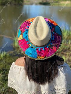 This beautiful Mexican Fedora is made out of Palm and has beautiful embroidered flowers. It is perfect to add that special touch to any outfit. The hat itself is made out of Palm and is very light and breathable. Find more colors here: https://www.etsy.com/es/listing/1004902053/sombrero-mexicano-de-palma-sombrero?ref=listing_published_alert Traditional Hat For Beach And Cinco De Mayo, Bohemian Wide Brim Hat For Cinco De Mayo, Multicolor Hats For Vacation And Cinco De Mayo, Multicolor Flat Brim Panama Hat For Festival, Embroidered Beach Cap, Multicolor Straw Hat With Flat Brim For Festivals, Multicolor Flat Brim Straw Hat For Festival, Multicolor Wide Brim Panama Hat For Festivals, Embroidered Beach Hats