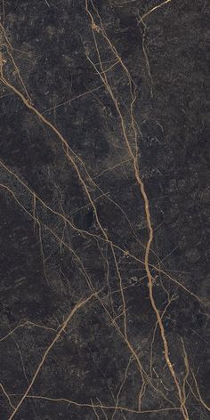 black marble with gold veining on it