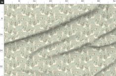 an image of a fabric with flowers and birds on the side, as well as a ruler