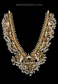 22 Karat Gold "Peacock / Guttapusalu" Necklace for Women with Cz, Beads, Pearls & Japanese Culture Pearls - 235-GN4480 - in 124.200 Grams for USD $9011.15. 
Made in India by Totaram Jewelers Online this product is in Gold - 22 Karat BIS Hallmark 916 KDM Gold  & is an excellent gift for Adult - Women. Ships fully insured with secured guaranteed delivery for free with your order over $250 from New Jersey USA & comes with 30 days exchange policy. 22k Gold Kundan Necklace For Reception, 22k Gold Temple Jewelry Kundan Necklace For Reception, 22k Gold Kundan Necklace For Reception In Temple Style, 22k Gold Temple Jewelry Bridal Necklace For Reception, Gold Necklace With Peacock Design For Receptions, Festival Reception Kundan Necklace With Peacock Design, Gold Bridal Necklace With Peacock Design For Reception, Traditional Kundan Necklace With Peacock Design For Reception, 22k Gold Temple Necklace With Peacock Design For Celebration