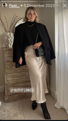 Silk Skirt Oversized Sweater, Silk Skirt Doc Martens, Christmas Party Outfits Satin Skirt, Date Night Outfit Ideas Fall, Silky Skirt Outfit Winter, Champagne Maxi Skirt Outfit, Satin Skirt Knee High Boots, Christmas Satin Skirt Outfit, Christmas Outfit Ideas For Women Elegant