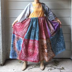 Handmade Earthy Bandana Dress/Blue Orange/SKU 11029 Size: OS. Approximate measurements laying flat: Pit to pit: 18.5". Pit to hem: 42.5". Shoulder to hem: 52". Waist: 18". Seen on 5'5" tall. In excellent condition. See pictures for full details. Multicolor Cotton Dress With Relaxed Fit, Multicolor Relaxed Fit Cotton Dress, Multicolor Paisley Print Maxi Dress For Festival, Multicolor Paisley Print Festival Maxi Dress, Festival Multicolor Paisley Print Maxi Dress, Multicolor Paisley Print Dress For Festival, Multicolor Cotton Dress With Paisley Print, Long Cotton Patchwork Dress, Bandana Dress