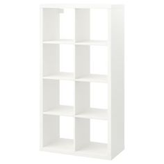 a white bookcase with four shelves on each side