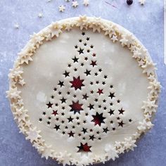 a pie with stars on it sitting on top of a table