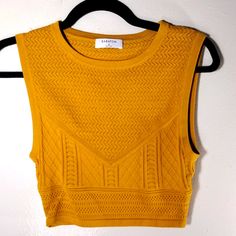 Excellent Condition No Flaws Noted. Measures 14 Inches Armpit To Armpit And 15 Inches Long. Mustard Fitted Sleeveless Top, Fitted Mustard Sleeveless Top, Casual Cropped Yellow Tank Top, Casual Yellow Tank Crop Top, Yellow Sleeveless Vest Top, Mustard Sleeveless Tank Top For Summer, Yellow Sleeveless Casual Crop Top, Casual Yellow Sleeveless Crop Top, Yellow Cropped Stretch Tops