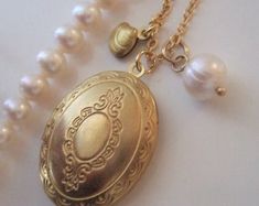 Secret message locketJewelry gift to Mother DaughterVintage | Etsy Secret Message Locket, Clam Pearl, Picture Pendant Necklace, Pearl Jewelry Gift, Vintage Style Necklace, Picture Locket, Brass Patina, Picture Pendant, Ear Jacket Earring