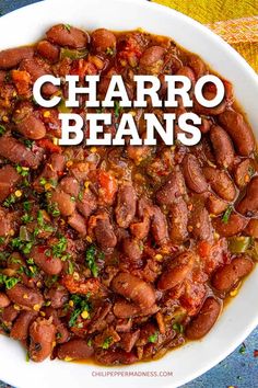 a white bowl filled with beans on top of a table