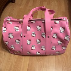 Brand New Super Cute Hello Kitty Pink Duffle Bag Roller Rectangular Hello Kitty Shoulder Bag For Travel, Hello Kitty Pink Shoulder Bag For Travel, Pink Hello Kitty Shoulder Bag For Travel, Travel Shoulder Bag In Pink With Hello Kitty Print, Pink Hello Kitty Travel Bag, Hello Kitty Print Shoulder Bag For Travel, Travel Rectangular Bag With Hello Kitty Print, Hello Kitty Print Travel Shoulder Bag, Bio Silk