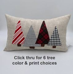 four christmas trees on a pillow with the text click thru for 6 tree color & print choices