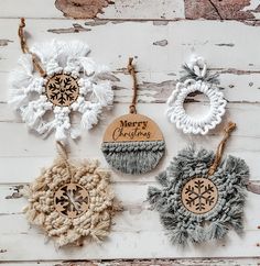 three ornaments are shown with the words merry christmas written on one ornament and snowflake