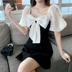 Size(cm) Bust Waist Sleeve Hip Length S 85.5 68 37 95 116 M 89.5 72 38 99 120 L 93.5 76 39 103 124 XL 97.5 80 40 107 128 Brand：Orchidmet Product Type:Dress Style:Sweety Sleeve Length:Short Sleeves Collar-line:Square Collar Waist Type: Normal Pattern Type:Solid Package:1*Dress Size tips: 1. Manual measurement, around 1cm difference allowed. 2. Due to reason of light and display,there may be a slight color difference between the picture and real product . Black Bow Mini Dress For Spring, Black Mini Dress With Bow For Spring, Spring Black Mini Dress With Bow, Black Mini Dress With Bow For Summer, Black Summer Dress With Bow, Black Puff Sleeve Dress For Spring Party, Black Short Sleeve Dress With Bow, Black Dress With Bow And Short Sleeves, Black Knee-length Dress With Bow