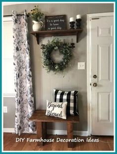 a wooden bench sitting in front of a door with a wreath on top of it