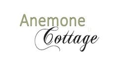 the logo for anemone cottage, which is located in front of a white background