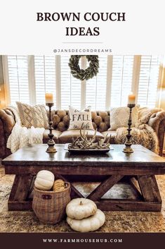 a living room filled with furniture and candles