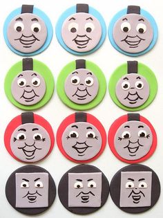 buttons with faces on them are arranged in rows