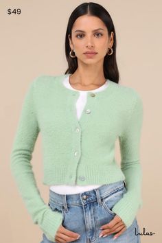 The Lulus Cozy Sweetness Mint Green Eyelash Knit Cropped Cardigan will be your favorite way to layer any look this season! Soft and fuzzy eyelash knit shapes this darling cardigan that features a classic crew neckline and long sleeves. The relaxed-fit bodice features a functional button placket along the center, before ending a trendy cropped hem. Contrasting ribbed knit accents the cuffs and hem. Fit: This garment fits true to size. Length: Size medium measures 17.75" from shoulder to hem. Bust Sage Green Cardigan, Mint Sweater, Mint Green Sweater, Mint Fashion, Fuzzy Cardigan, Cardigan Crop, Green Cardigan, Cropped Cardigan, Cup Size