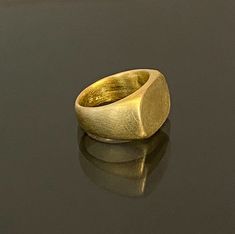 18k solid gold Signet Ring, 18k gold Square Statement Ring, Handmade, Fine Jewelry, Unisex gold signet ring Resizable. Available in 14k solid Gold & silver Size 13.5 US size 6.5 Weight 14.8g Square top 11 mm \ 16 mm (Please contact me for a different size or metal and the Price) Free Shipping! You are welcome to visit my shop for more of my designs: https://www.etsy.com/shop/GoldArtJewelry More Rings: https://www.etsy.com/shop/GoldArtJewelry Please take a moment to read my shop policies befo Heirloom Yellow Gold Signet Ring With Thick Band, Luxury Signet Ring With Smooth Bezel As Gift, Gold Signet Ring With Smooth Bezel As Gift, Untreated Yellow Gold Signet Ring As Gift, Hand Forged Yellow Gold Signet Ring For Wedding, Classic Yellow Gold Ring, Gold Signet Ring With Smooth Bezel For Gift, Gold Formal Signet Ring In Fine Jewelry Style, Gold Fine Jewelry Signet Ring For Formal Occasions