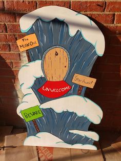 a cardboard cut out of a cartoon character with words written on the front and back